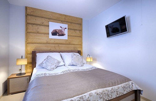 Szaflary Cama Y Desayuno | Apartamentos de lujo con SPA, que combinan folk tradicional de montaña con comodidad.