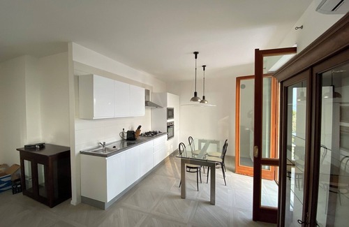 Predore Casa | Apartamento de lujo en el lago con jardín privado.