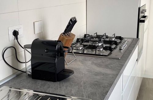 Predore Casa | Apartamento de lujo en el lago con jardín privado.