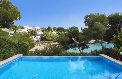 Cala d'Or Casa | Villa de lujo frente al mar, justo en la playa, a 20 m de la ciudad, piscina climatizada (abril-octubre)