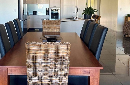 Banksia Beach Casa | Luxury canal home with pontoon and pool. Direct access to Pumicestone passage.
