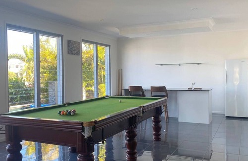 Banksia Beach Casa | Luxury canal home with pontoon and pool. Direct access to Pumicestone passage.