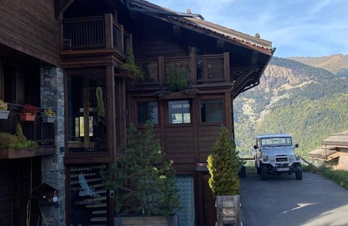 Le Praz Chalet De Esquí | Chalet moderno en Courchevel Le Praz con piscina, billar y acceso directo a pistas