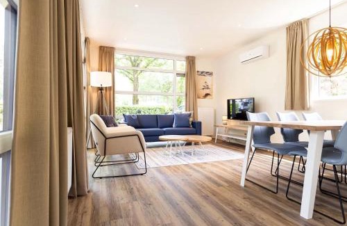 Ede Chalet De Esquí | Luxury chalet with dishwasher in a holiday park in the middle of De Veluwe