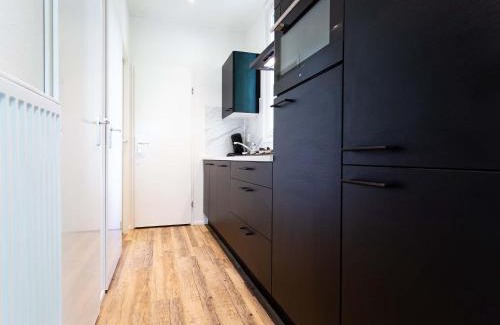 Ede Chalet De Esquí | Luxury chalet with dishwasher in a holiday park in the middle of De Veluwe