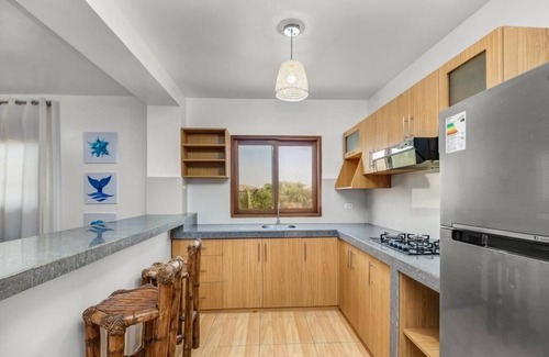 Máncora Condominio | Apartamento privado en condominio de estilo Tiki con piscinas cerca de la playa de Máncora