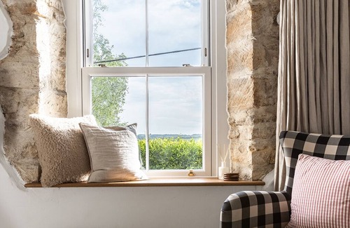 Inchbrook Cabaña | Luxury Cotswold cottage with valley views and stylish interiors.