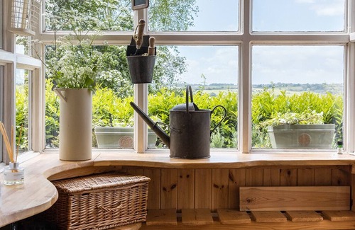 Inchbrook Cabaña | Luxury Cotswold cottage with valley views and stylish interiors.