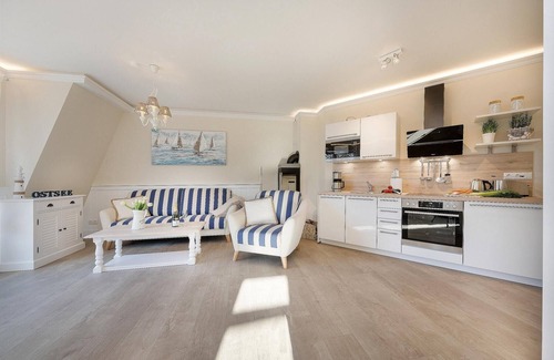 Zingst Apartamento | Luxury vacation apartment right by the sea with sauna and fireplace.