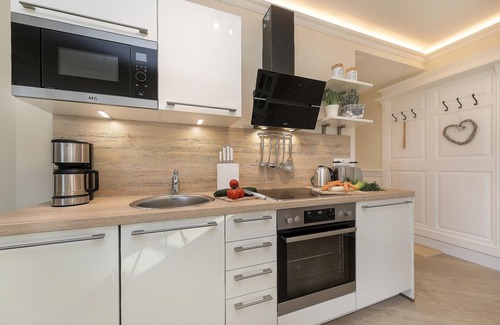 Zingst Apartamento | Luxury vacation apartment right by the sea with sauna and fireplace.