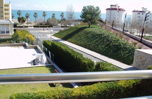 Sant Carles de la Rapita Apartamento | Urbanización lujo frente al mar, piscina y garaje