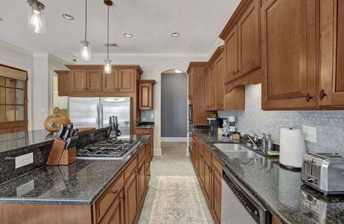 Central Gardens Casa | Luxury home with outdoor patio and game room