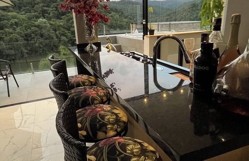 Rio dos Cedros Casa | Luxury house by the lake, Spa, access to water.