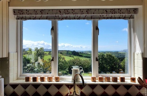 Colwyn Bay Casa | Capacidad para 12 personas: piscina climatizada al aire libre, amplios jardines, hermosas vistas.