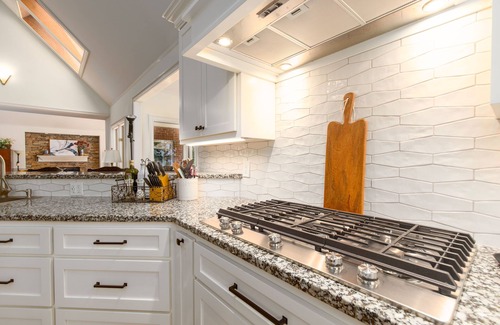 Cumming Casa | Luxury lake home, private sandy beach, huge covered double dock.