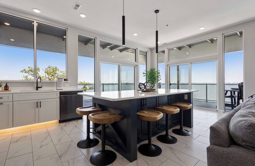 Watertown Condominio | Luxury Lakefront Condo w/ Private Hot Tub & Sauna