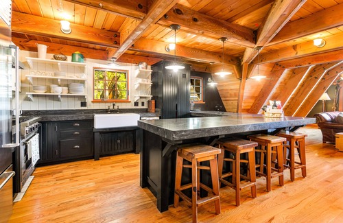 Serene Lakes Casa | Luxury lakefront home with private hot tub, on-site dock, fireplace & HOA beach
