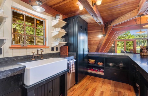 Serene Lakes Casa | Luxury lakefront home with private hot tub, on-site dock, fireplace & HOA beach