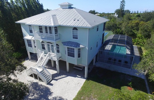 South Venice Villa | Villa de lujo de 5 dormitorios para un máximo de 10 personas con pista de tenis y piscina en la playa de Manasota