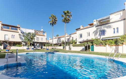 Marina de Casares Casa | Luxury modern beachfront 3 bed gated community townhouse with pool, sun terrace, sea views close to all amenities