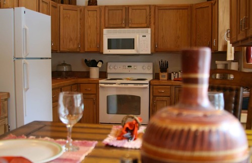 Taos Villa | LUXURY MOUNTAIN VIEW SUITES The Mountain View is a large pueblo styled home