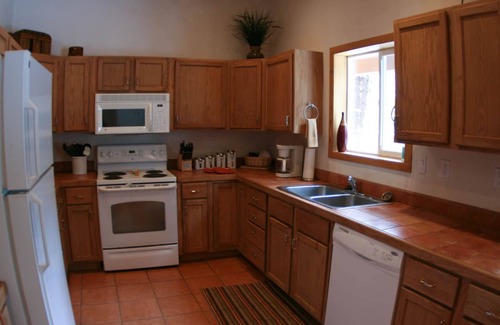 Taos Villa | LUXURY MOUNTAIN VIEW SUITES The Mountain View is a large pueblo styled home