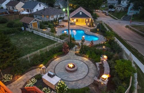 Southeast Omaha Casa | Luxury Oasis Heated Pool, Hot Tub, BBQ