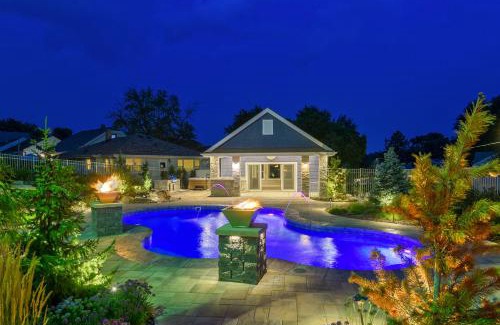 Southeast Omaha Casa | Luxury Oasis Heated Pool, Hot Tub, BBQ