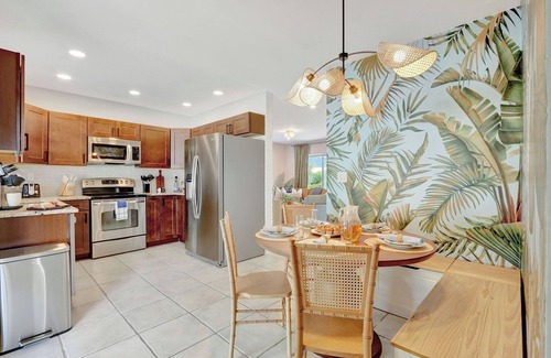 Garden Isles Casa | Luxury Oasis W/ Htd Pool ~ 10min to Beach, Game Room & Fire Pit