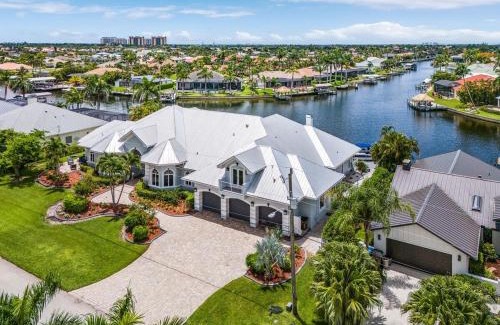 Pelican Casa | Luxury Resort-Style Saltwater Pool Home in SW Cape Coral