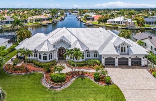 Pelican Casa | Luxury Resort-Style Saltwater Pool Home in SW Cape Coral