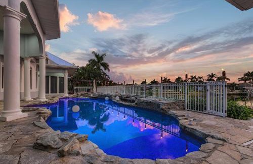 Pelican Casa | Luxury Resort-Style Saltwater Pool Home in SW Cape Coral