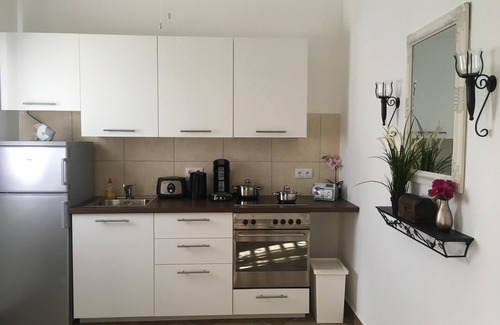 Cas Grandi Apartamento | Apartamento de lujo con piscina, frente al mar, ADMINISTRACIÓN muy tropical, GERMAN