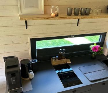 Sehestedt Casa | Lykke Huus Tinyhaus am Meer mit Fasssauna