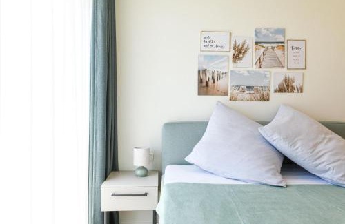 Marienleuchte Apartamento | Lykke – Traumhafte Ferienwohnung mit Garten und Meerblick in erster Reihe!