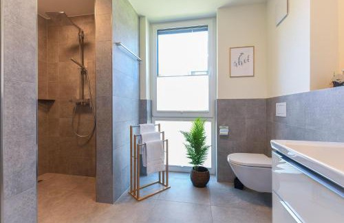 Marienleuchte Apartamento | Lykke – Traumhafte Ferienwohnung mit Garten und Meerblick in erster Reihe!