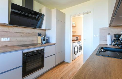Marienleuchte Apartamento | Lykke – Traumhafte Ferienwohnung mit Garten und Meerblick in erster Reihe!