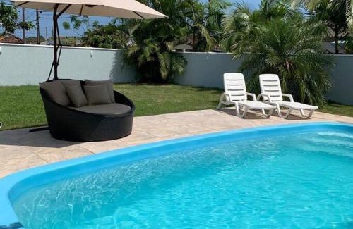 Matinhos Casa | M&M House - Casa com Piscina e Ar Condicionado em Matinhos