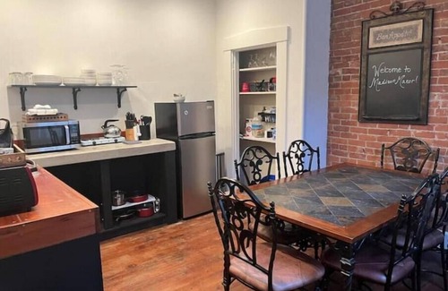 Madison Casa | "Madison Manor I" by The River: Nice patio, hot tub, gas grill, and fire pit