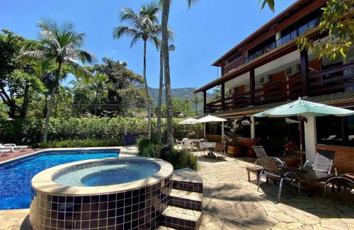 Lazaro Casa | Magnífica casa pé na areia 4 suítes c/ar e piscina