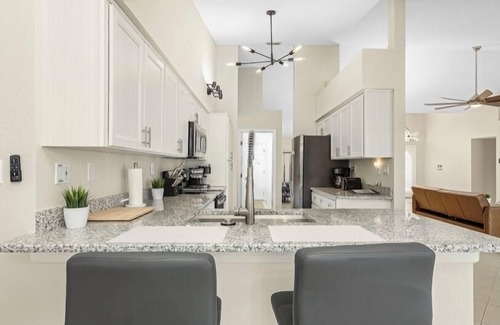 Punta Gorda Casa | MAGNIFICENT! LUXURY WATERFRONT HOME;BIG HEATED POOL-80’ DOCK! 5 MIN FISH VILLAGE