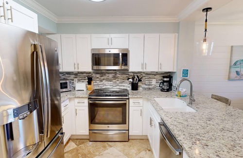 Holiday Isle Condominio | Magnolia House 103 2 Bedroom Condo by RedAwning