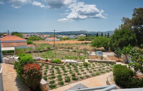 Kithira Casa | Maira Arch House
