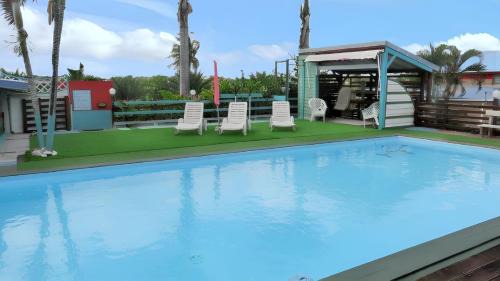 Sainte-Anne Casa | Maison charmante à Sainte Anne avec piscine partagée