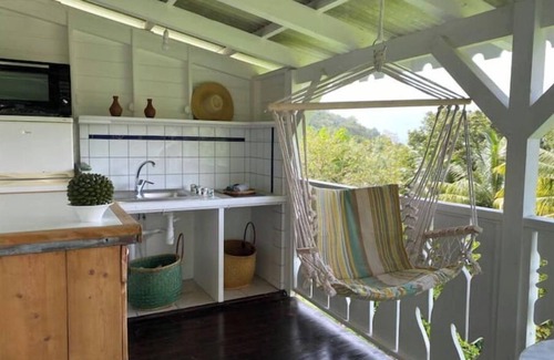 Fonds Saint Denis Casa | Maison en Bois en Pleine Nature