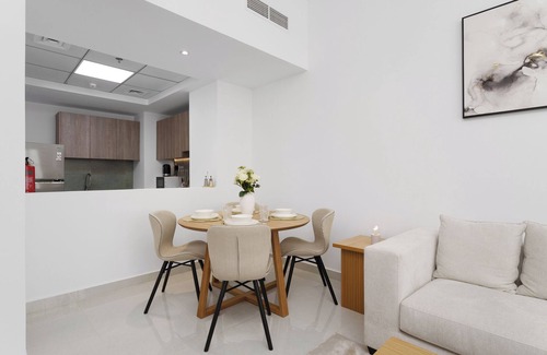 Discovery Gardens Apartamento | Maison Privee - Tranquil Escape w/ Balcony and High-End Facilities