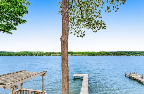 Town of Milo Casa | Majestic lakefront home with game room & fireplace - dog-friendly