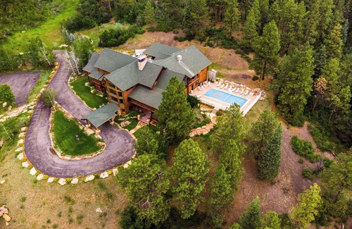 Purgatory Casa | Majestic Manor with Private Pool, Theater Room, Large outdoor wedding altar