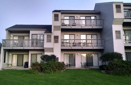 Acme Condominio | Hacer recuerdos en Grand Traverse East Bay.