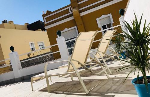 Las Acacias Casa | Malaga Beach House, 2 city bikes, 2 children's bikes, WiFi, BIG terrace, BBQ, Family, Childfriendly